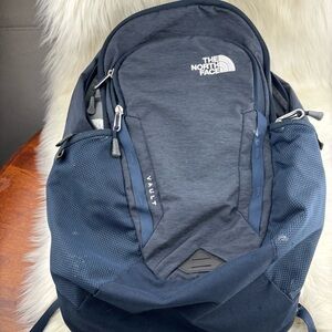The North Face Blue Backpack with Durable Design and Versatile Functionality